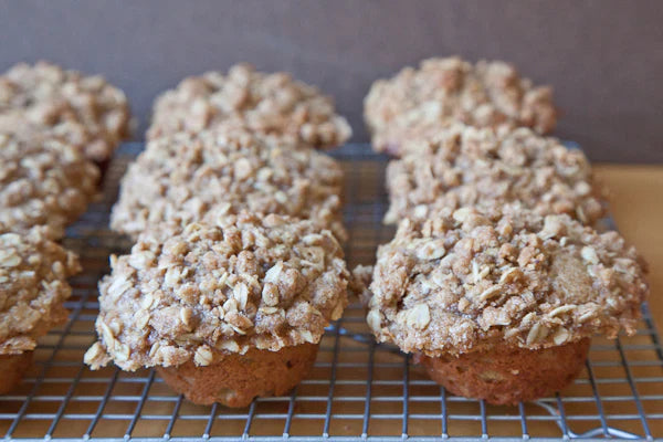 Strawberry Jam Filled Banana Peanut Butter Oat Muffins with Oatmeal Crumb Topping