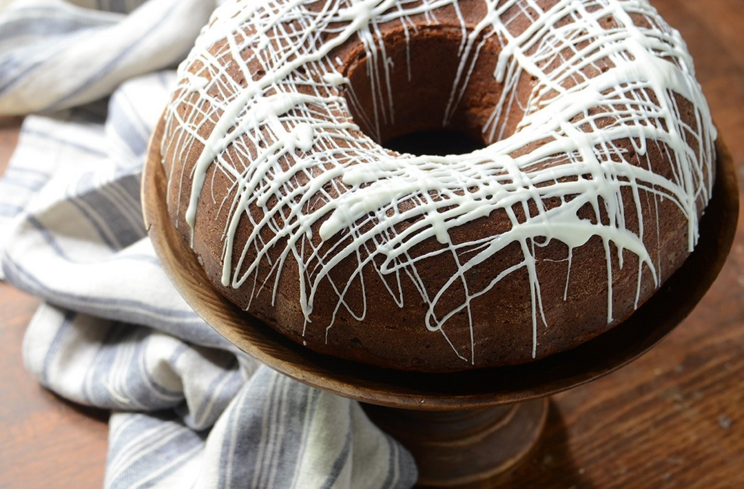 Peanut Butter Bundt Cake with Dark Chocolate Chips and White Chocolate Glaze
