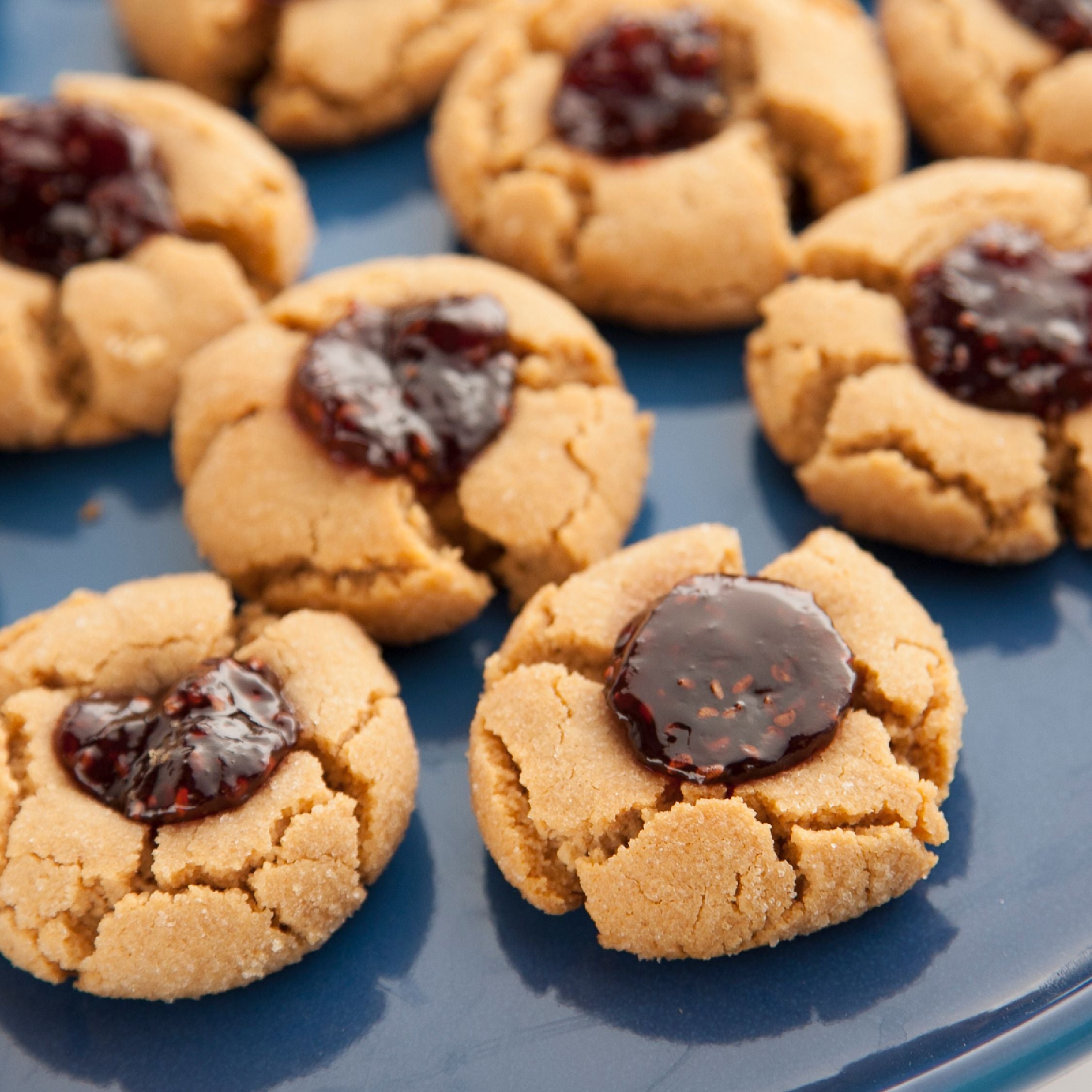 VIDEO RECIPE Peanut Butter & Raspberry Jam Thumbprint Cookies Peanut